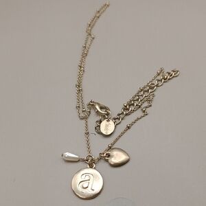 Daire's Elegant Gold Tone Necklace with Heart and Initial Pendant
